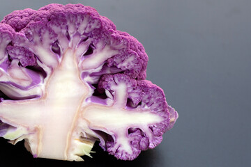 Purple cauliflower on dark background.