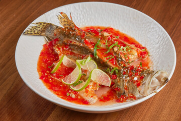 chinese food on plate photographed at high angle, restaurant food, chinese traditional cuisine