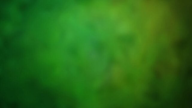 Abstract Blurred Green Liquid Animation with Flowing and Shifting Light Effects - Soft Blurred Motion and Magical Illuminated Glow