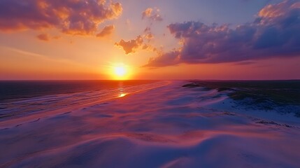 Vibrant sunset over tranquil ocean, colorful sky reflected on water, perfect for relaxation and nature appreciation.