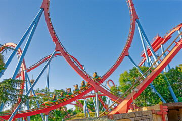 Roller Coaster in funny amusement park.