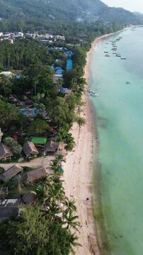 Tropical beach, turquoise waters and lush vegetation of chalok baan kao bay, koh tao island, thailand