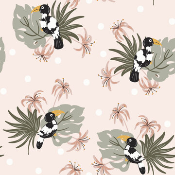 Pretty garden of palms and lilies with cute toucan birds enjoying nature. Subtle color palette of pink, green, white, cream and black. Bird of paradise seamless vector pattern. Great for home decor.