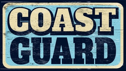 Aged and worn coast guard sign on wood © jdoms