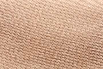 Fototapeta premium Beige microvelour texture. Fabric background