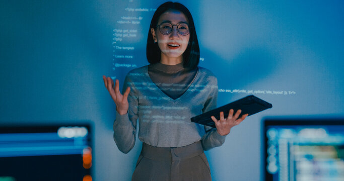 Group adult Asia female software developer mentor leader manager talk strategy plan to executive write prompt AI bot IT app program nomad, video game, designer, data center. Projecting slideshow code.