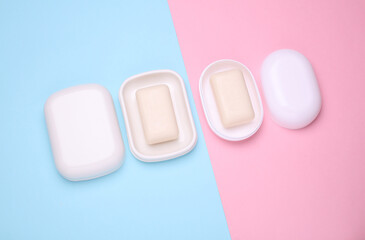 Soap dishes on blue pink pastel background