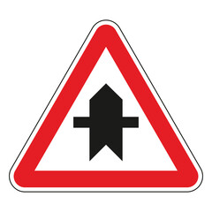 Red and white triangular warning road sign indicating a side road joining from the left