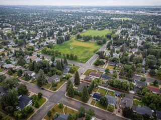 City view of a residential area with a park in the middle