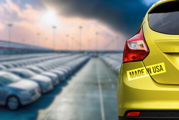 A car factory, a new car and stickers made in the USA