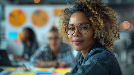 A diverse group of professionals engaged in a strategic planning session, surrounded by sleek digital interfaces and brainstorming boards in a creative setting.