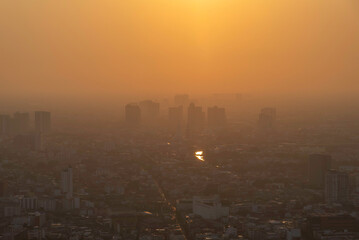 PM 2.5 dust in the atmosphere in the city,blurred sky dark with air pollution smoke cloud dust mist for background, problem in atmosphere sky environment, toxic pollution in atmosphere smog mist for