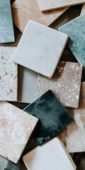Assortment of Marble and Stone Tiles in Various Earth Tones and Textures