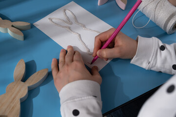 Creating Easter rabbit bunny with cotton rope Storytelling of creating craft Easter greeting card...