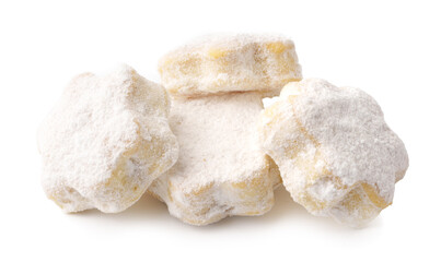 Delicious small cookies covered in powdered sugar arranged on a white surface