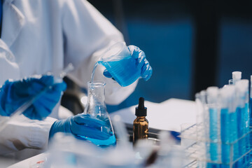 Microbiological research with a test tube and micropipette in close -up