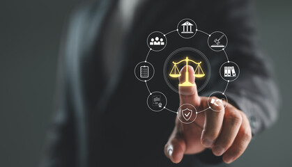 Legal Professional with Justice Icons. A suited legal professional touches virtual icons symbolizing law, justice, and legal services. business legislation, Notary public, legal advice online, Lawyer