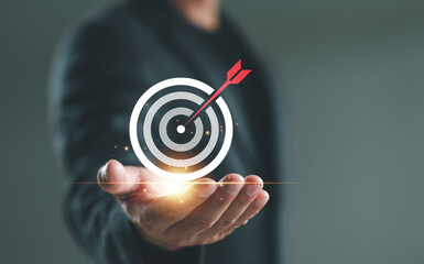 Targeting business concept. Businessman show virtual target icons for business objective. Strategic...