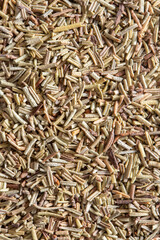 Close-up of dried rosemary cooking herb background. Dried herb food concept.