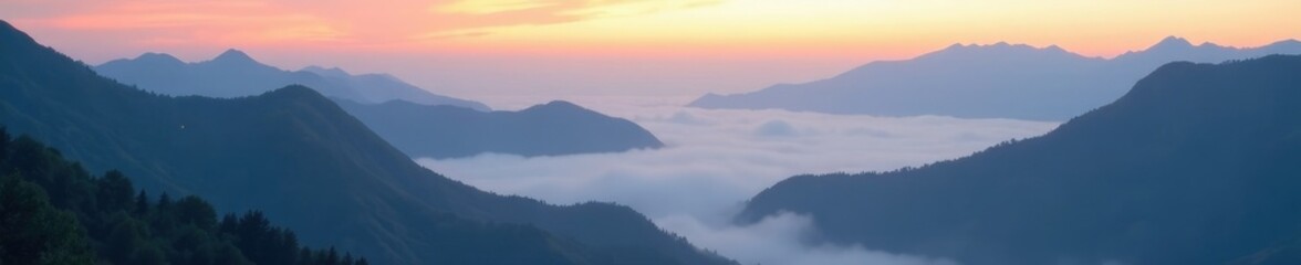 Misty dawn light creeps over mountain peaks with cloudy valley below, mountains, soft, serene