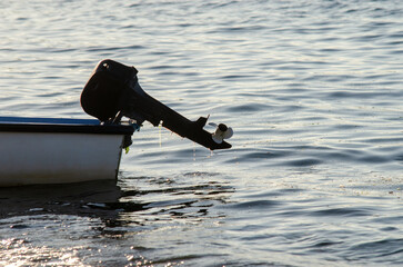 fishing boat in the water whit hold engine