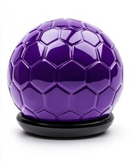 Fototapeta premium A vibrant purple soccer ball resting on a black base, perfect for sports-themed designs and activities.