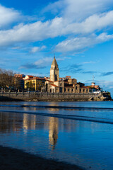 view on church with its reflection in the water
