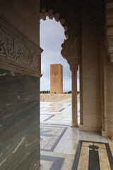 Fototapeta premium View from the Mausoleum of Mohammed V to the Hassan Tower, Rabat