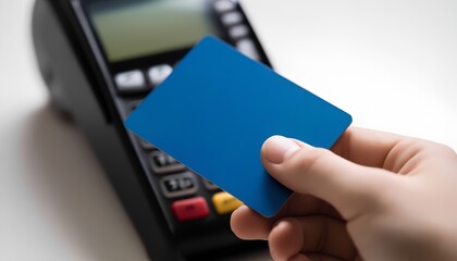 Close-Up of Hand Holding a Debit Card Against an EDC Machine &ndash; Cashless Payment and Digital Transactions