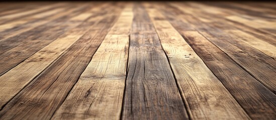 Rustic barn wood floor with weathered brown tones and subtle grain intricacies, angled view creating a warm, inviting atmosphere.