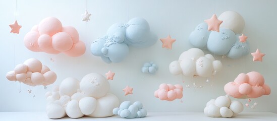 Whimsical pastel clouds and stars in soft pink, blue, and white shades arranged playfully against a light background evoking imagination and fun