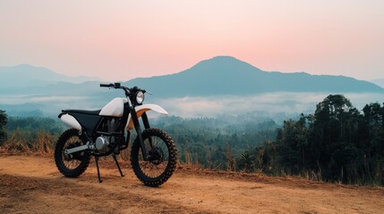 Fototapeta premium Cultural iconic Thailand, A dirt bike stands on a rugged trail with mountainous scenery and a colorful sky at dawn, showcasing adventure and exploration.