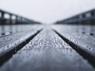 Close-Up Low Angle View of a Rainy Wooden Boardwalk  Surface on a Foggy Day