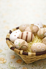 Simple, calm and coloring beautiful easter eggs in the basket. Greeting card design. copy space.