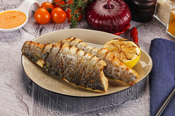 Grilled seabass fillet with lemon