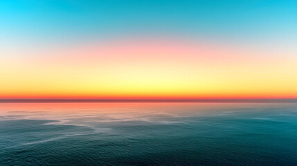 Fototapeta premium Pink and Blue Sunset over the Ocean: A Serene Seascape Photography