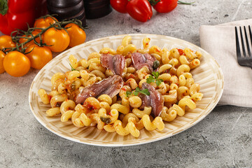 Italian pasta cellentani with anchovy