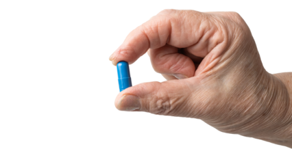 Senior female hand holding one blue medicine capsule, antibiotic pills, vitamins, or painkillers, isolated on a transparent background. Healthcare and treatment concept