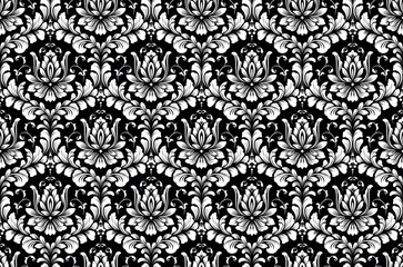 Wallpaper in the style of Baroque. White and black floral ornament. Seamless vector background. Graphic pattern for fabric, wallpaper, packaging. Ornate Damask flower illustration.