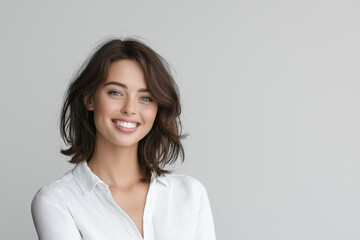 Obraz premium A studio portrait of a woman showing playful energy, sticking her tongue out slightly