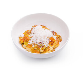 Tasty baked bananas topped with shredded coconut in a clean bowl on a white background