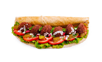 Delicious falafel wrap filled with fresh vegetables and creamy sauce at a vibrant street food market