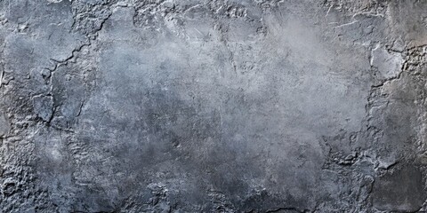 Gray abstract plaster texture with rough surfaces and a blend of light and dark shades ideal for design backgrounds and ample copy space for text.