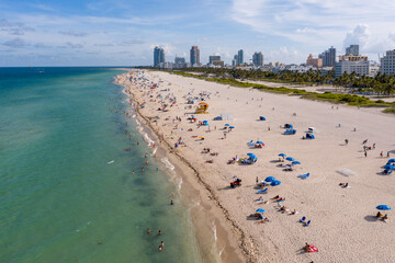 Aerial view of South beach crowded with tourists at daytime