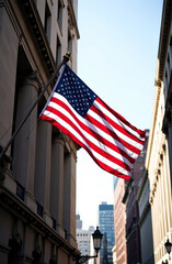 US flag in downtown against the backdrop of buildings in America.