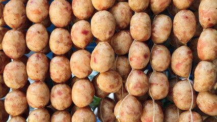 Northeastern Thai Sausage Set (Thai called Sai Krok E-san) Isaan Sausage Set hanging on the shelf 