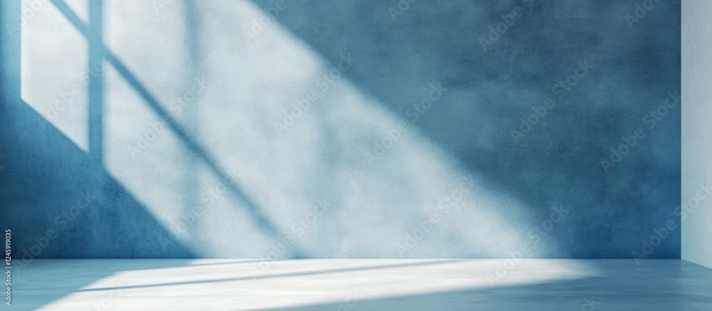 Poster blue textured plaster wall with soft shadows and natural light creating an ideal minimalist backgrou