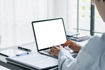 Fototapeta premium business people working with laptop at office, empty white screen..