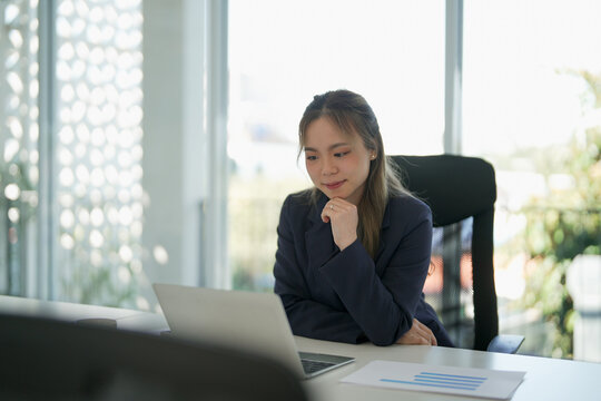 Asian female working in workplace happy and mindfulness.