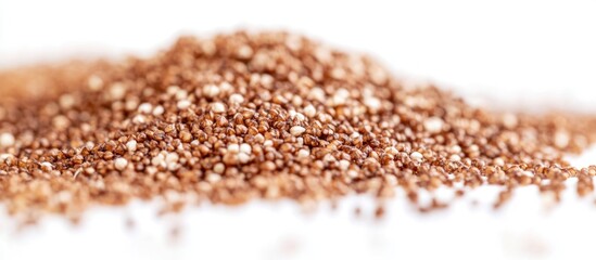 Buckwheat seeds heap on white background showcasing organic grains for health and nutrition concepts
